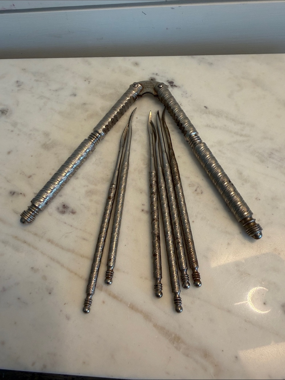 Vintage HMQ lobster claw and picks